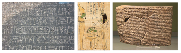 Some ancient texts - Rosetta Stone, Book of the Dead papyrus, and a cuneiform clay tablet.